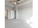 Spacious bedroom featuring soft carpet, a ceiling fan, and an en-suite bathroom for ultimate comfort and convenience at 38 Lakeview Pt, Dallas, GA 30157