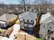 Stunning aerial view of a modern two-story home with a gray roof and inviting double balconies at 727 Garibaldi Sw St, Atlanta, GA 30310