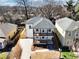 Aerial view of a newly constructed two-story home featuring a gray roof and double balconies at 727 Garibaldi Sw St, Atlanta, GA 30310