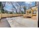 A spacious backyard featuring a wood deck with a new wooden privacy fence at 727 Garibaldi Sw St, Atlanta, GA 30310