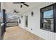 Outdoor balcony with modern black trim, ceiling fans, and ample space for relaxation at 727 Garibaldi Sw St, Atlanta, GA 30310