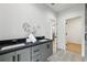 Modern bathroom featuring a dual sink vanity with gray cabinets, and white countertop at 727 Garibaldi Sw St, Atlanta, GA 30310