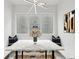 Bright breakfast nook features built-in seating, a stylish light fixture, and abstract art at 727 Garibaldi Sw St, Atlanta, GA 30310
