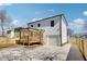 A view of the new construction with a covered back porch, and a large driveway at 727 Garibaldi Sw St, Atlanta, GA 30310
