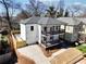 This new home has a 2 story front elevation with double porches and a new driveway at 727 Garibaldi Sw St, Atlanta, GA 30310