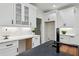 A kitchen with stainless steel appliances, plenty of counter space, and modern lighting at 727 Garibaldi Sw St, Atlanta, GA 30310