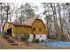 Backyard of the house features a pool under a tarp and partially fenced yard at 110 Casa Domain Ct, South Fulton, GA 30349