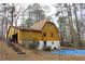 Exterior view of a two-story home with a spacious yard and potential for outdoor enjoyment at 110 Casa Domain Ct, South Fulton, GA 30349