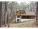 Two-story home nestled in a wooded setting; perfect for a tranquil retreat at 110 Casa Domain Ct, South Fulton, GA 30349