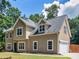 Beautiful two-story home with attached garage and well-maintained lawn at 144 Wyckliffe Dr, Locust Grove, GA 30248