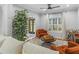 Cozy living room featuring neutral walls, stylish furniture, and ample natural light at 144 Wyckliffe Dr, Locust Grove, GA 30248