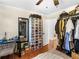This walk-in closet features ample storage for shoes, clothing, and accessories at 144 Wyckliffe Dr, Locust Grove, GA 30248