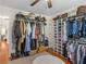 This spacious walk-in closet features ample storage for clothing, shoes, and accessories at 144 Wyckliffe Dr, Locust Grove, GA 30248