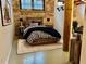 Comfortable bedroom with exposed brick and wooden accent wall at 170 Boulevard Se # E005, Atlanta, GA 30312