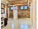 Open layout with exposed brick walls, high ceilings, and industrial-style details at 170 Boulevard Se # E005, Atlanta, GA 30312