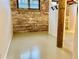 Spacious open living space with exposed brick and industrial design elements at 170 Boulevard Se # E005, Atlanta, GA 30312