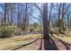 The backyard has a large grassy area and mature trees at 2202 Polar Rock Sw Pl, Atlanta, GA 30315