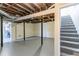 Unfinished basement area with access to stairs leading to main level at 2202 Polar Rock Sw Pl, Atlanta, GA 30315