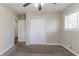 Bedroom with plush carpet, closet and windows with natural light at 2202 Polar Rock Sw Pl, Atlanta, GA 30315