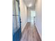 Inviting entryway with light LVP flooring, leading to the home's interior at 2407 Malster Ln, Lawrenceville, GA 30043