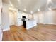 Open-concept kitchen with a large island, granite countertops, and stainless steel appliances at 2407 Malster Ln, Lawrenceville, GA 30043