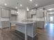 Spacious kitchen featuring shaker cabinets, granite countertops, and stainless steel appliances at 76 Lakeview Pt, Dallas, GA 30157