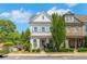 Charming two-story home boasts tidy landscaping, a cozy front porch, and a well-maintained exterior at 122 Brighton Blvd, Woodstock, GA 30188