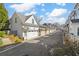 Rear-entry garages providing convenience and curb appeal within this well-maintained residential community at 122 Brighton Blvd, Woodstock, GA 30188
