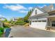 A detached two-car garage with a pristine white door, offering secure parking and additional storage space at 122 Brighton Blvd, Woodstock, GA 30188