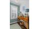 Stylish hallway with unique wallpaper, accent lighting, and decorative console table at 122 Brighton Blvd, Woodstock, GA 30188
