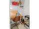 Compact office space with a sleek desk, swivel chair, shelving, and ample storage solutions at 122 Brighton Blvd, Woodstock, GA 30188
