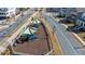 Aerial shot of a neighborhood playground with slides and sunshades, bordered by a white fence at 122 Brighton Blvd, Woodstock, GA 30188