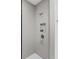 A minimalist shower with neutral tiling, a built-in niche, and modern fixtures at 122 Brighton Blvd, Woodstock, GA 30188