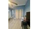 Living room featuring hardwood floors, closet and neutral paint color at 172 Scarsdale Dr, Riverdale, GA 30274
