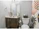Bathroom featuring modern fixtures, a toilet, vanity, and patterned shower curtain at 6336 Lake Valley Pt, Lithonia, GA 30058