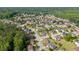 This aerial view showcases a leafy, well-planned residential neighborhood with mature trees and well-maintained homes at 3162 Abbey Sw Dr, Atlanta, GA 30331