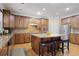 Well-lit kitchen features stainless steel appliances, granite countertops, and central island with bar stool seating at 3162 Abbey Sw Dr, Atlanta, GA 30331