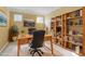 Bright home office with built-in shelving and ample workspace at 3162 Abbey Sw Dr, Atlanta, GA 30331