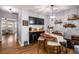 Inviting dining area with stylish bar, cabinetry, and decor at 509 Grove Field Ct, Suwanee, GA 30024