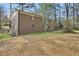 Backyard view of the house with brick exterior at 3339 Brenda Ln, Lithia Springs, GA 30122