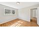 Bright bedroom boasts gleaming hardwood floors and natural light at 3339 Brenda Ln, Lithia Springs, GA 30122