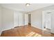Bedroom with hardwood floors and a closet at 3339 Brenda Ln, Lithia Springs, GA 30122