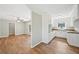 Country kitchen with white cabinets, rustic wood countertops, and neutral flooring at 3339 Brenda Ln, Lithia Springs, GA 30122