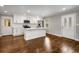 Modern kitchen with white cabinets, stainless steel appliances, and a center island at 2026 Swazey Dr, Decatur, GA 30032