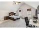 Spacious main bedroom boasting vaulted ceilings, plush carpet, and ample natural light from two windows at 4022 Rosebud Park Dr, Snellville, GA 30039