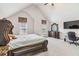 Main bedroom with vaulted ceiling with ample room and natural light, perfect for rest and productivity at 4022 Rosebud Park Dr, Snellville, GA 30039