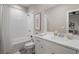 Bathroom featuring a shower/tub combo and a vanity with a white countertop at 1944 Westside Nw Blvd, Atlanta, GA 30318