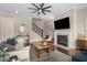 Bright living room with hardwood floors, fireplace, and large windows providing natural light at 1944 Westside Nw Blvd, Atlanta, GA 30318