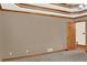 A bedroom with a trey ceiling and doorway with a wooden door at 2705 Luke Edwards Rd, Dacula, GA 30019