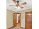 Bedroom with ceiling fan and doorway into another room at 2705 Luke Edwards Rd, Dacula, GA 30019